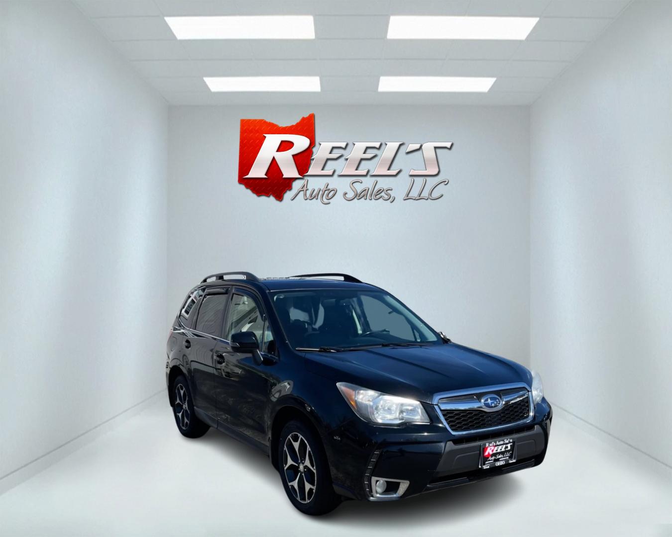 2014 Black /Black Subaru Forester 2.0XT Touring (JF2SJGMC4EH) with an 2.0L H4 SOHC 16V TURBO engine, Automatic transmission, located at 547 E. Main St., Orwell, OH, 44076, (440) 437-5893, 41.535435, -80.847855 - Photo#2